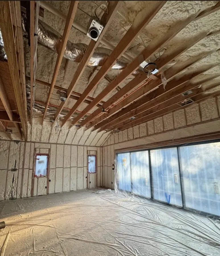 Interior walls and ceiling insulated with spray foam during new construction in Southaven